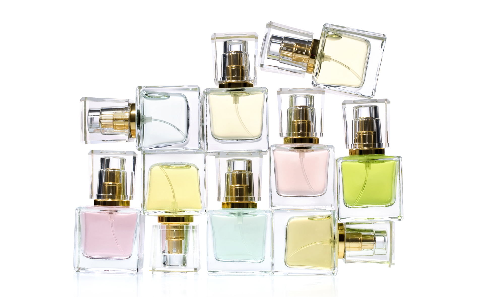 Perfume in bottles over white background
